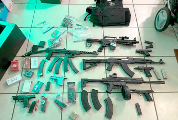 Police recovered these firearms from the barricaded home of a convicted felon in Kissimmee in April 2022. PHOTO/DEPT. OF JUSTICE