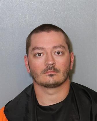 Jason Warren, 28, an IT tech with the Osceola County School District, was arrested Thursday and charged with two counts of possession of child pornography.