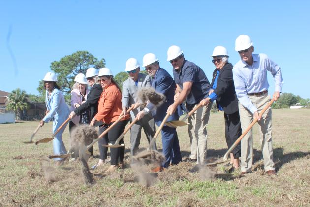 Local leaders break ground Tuesday on the Buen Vecino affordable housing project for seniors in Buenaventura Lakes.