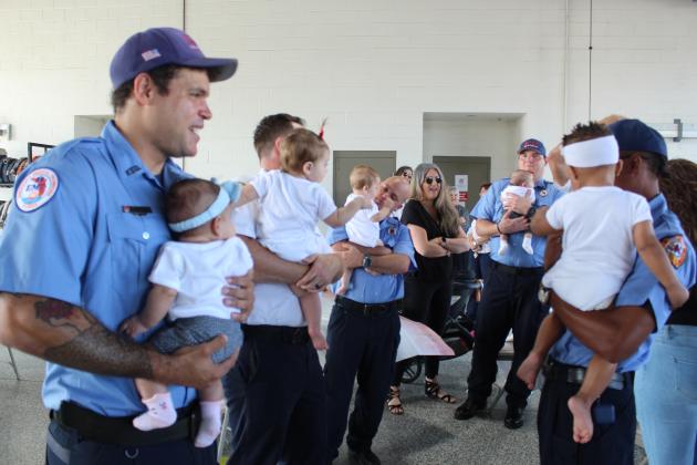 "This is unlike anything I've ever seen," said KFD Fire Chief Jim Walls at Thursday's celebration of the firefighters' baby boom. PHOTO/KEN JACKSON