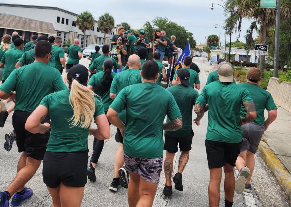 A few raindrops and some traffic couldn’t deter our area’s law enforcement from participating in the annual Special Olympics Torch Run down Main Street in Kissimmee Friday. PHOTO/KEN JACKSON