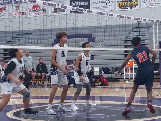 Celebration swept Tohopekaliga on Thursday night to capture their second consecutive OBC Championship.  Oliver Binet (14), Diego Rivera (6) and Julio Tova (14) get ready to defend as Tiger outsider hitter Jevon Andrew-Brown (23) awaits the serve. PHOTO/J. DANIEL PEARSON