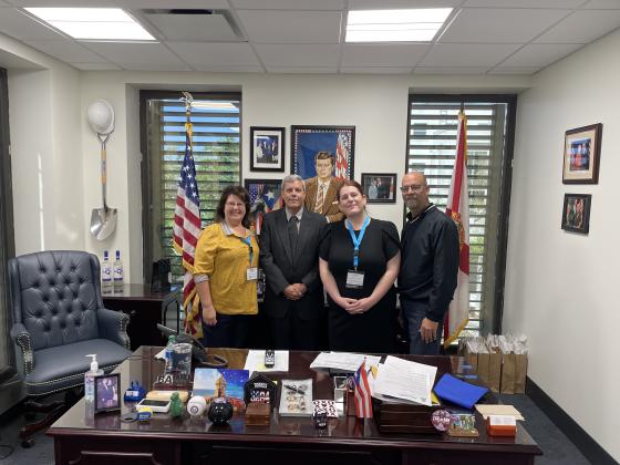 From left, Kelly Bender, OCOA Clinical Care Coordinator, Al Yorston the aide to Senator Torres, Christina Swiridowsky, Chief of staff for FAFCC, and Ron Bender, OCOA Health Clinic volunteer. PHOTO/COUNCIL ON AGING