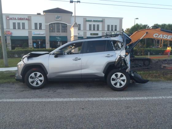 The driver of this vehicle was rear-ended by another who tried to flee the scene Tuesday morning on northbound John Young Parkway south of downtown Kissimmee. PHOTO/FHP