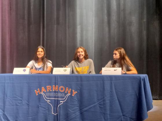 Longhorn soccer standouts Daniela Canizales Rebekah Wiles and Brynn Magner signed letters of intent last week. PHOTO/J. DANIEL PEARSON