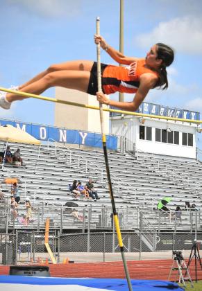 Hannah Vickers won the pole vault (pictured), broke Harmony’s record in the triple jump and also qualified for regionals in the javelin as the Longhorns won the District 4A-9 girls track team championship. PHOTO/KATIE WILLIAMS