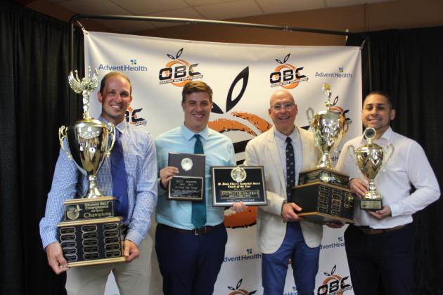 Harmony boys basketball coach coach Dustin “Duke” Leonardo (second from left) was presented the Dean Cherry Memorial Coach of the Year Award. PHOTO/KEN JACKSON