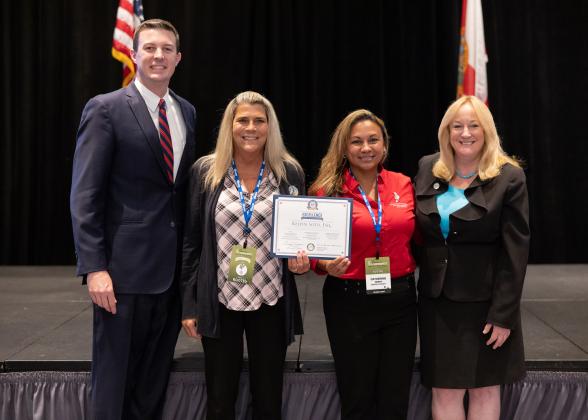 Civil Division Director Michelle Shephard and Criminal Division Director, Catherine Smith, whose divisions were heavily involved in ensuring the office’s adherence to the best practices, accepted the award. PHOTO/OSCEOLA CLERK AND COMPTROLLER'S OFFICE