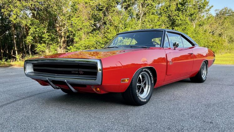 This 1970 Dodge Charger in Hemi Orange is an example of one of the 1,500 cars expected to cross the auction block at the July 6-9 Mecum Summer Special auction. PHOTO/MECUM    