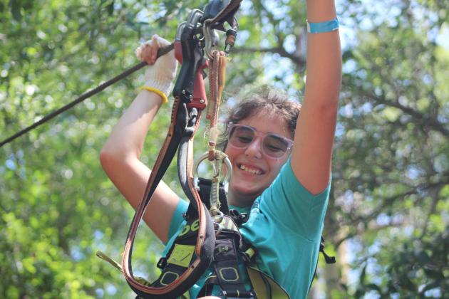 Children in danger of losing their sight recently got the chance to improve their mobility — and confidence — during a recent excursion to Orlando Tree Trek Adventure Park, north of Reunion. PHOTOS/LIGHTHOUSE