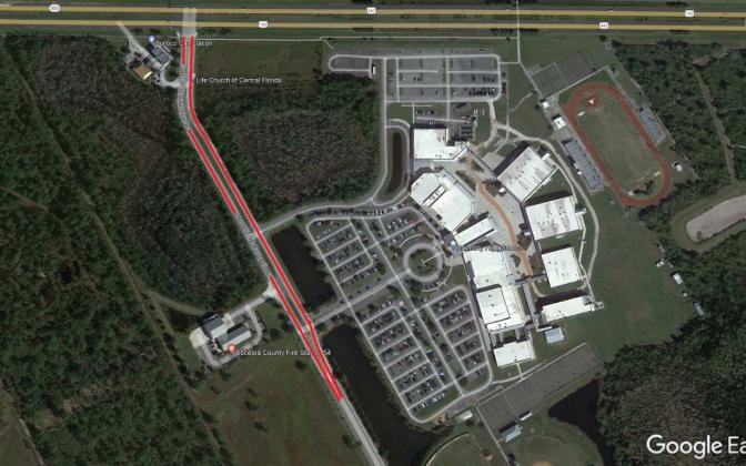 The road leading into Harmony High and Middle will be resurfaced this week. PHOTO/OSCEOLA COUNTY