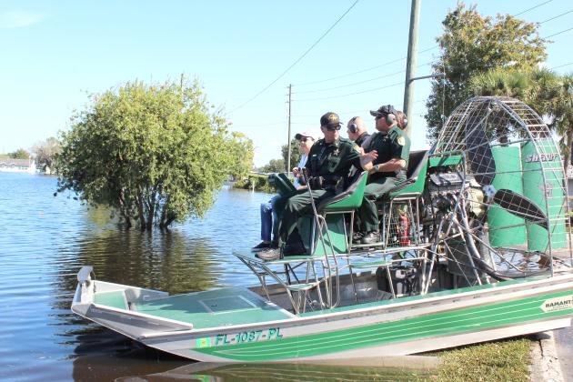 Florida Attorney General Ashley Moody toured the flooded Good Samaritan Village with Sheriff Marcos Lopez. Much of the neighborhood is now uninhabitable, and dwellings have started to be bulldozed. FILE PHOTO