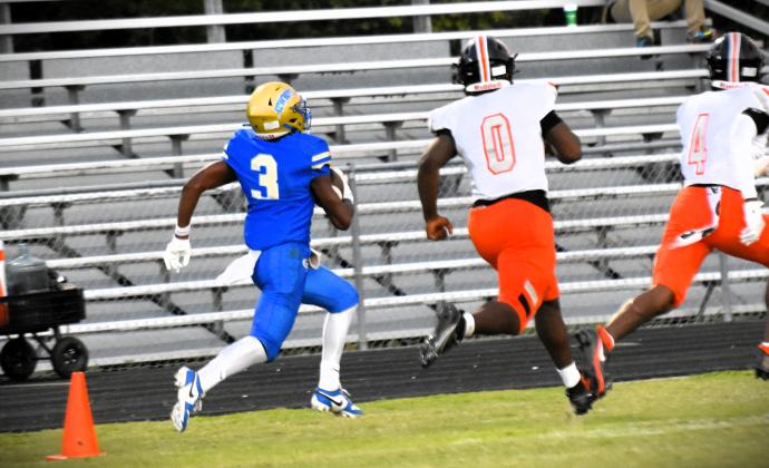Osceola's Notorious Reynolds runs for daylight Friday against Lakeland. PHOTO/KATIE WILLIAMS