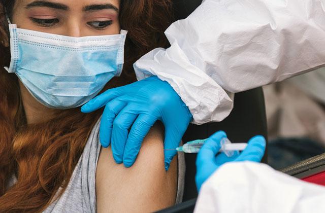 In the latest round of battling between federal and DeSantis administration officials about COVID-19 issues, Florida Surgeon General Joseph Ladapo advised people under age 65 not to receive the newly-approved COVID-19 booster vaccines. FILE PHOTO