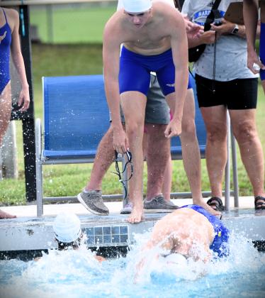 Harmony's relay team goes to work at Thursday's Orange Belt Conference swim meet. PHOTO/KATIE WILLIAMS
