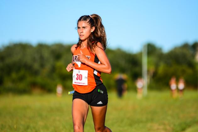 Harmony's Leilana Decker defended her OBC championship with a winning time of 20:11.32. PHOTO/DONALD LAMB