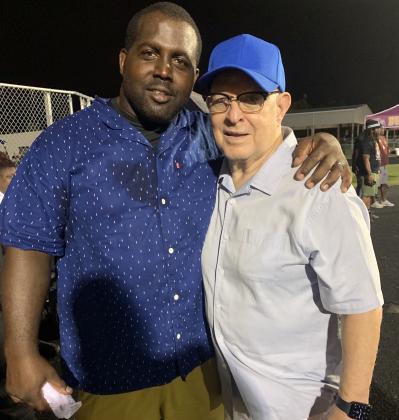 Former Osceola running back Willie Green (1996-99), who was 2nd in Florida all-time in rushing yards and 1st in touchdowns when he graduated, with Coach Jim Scible.