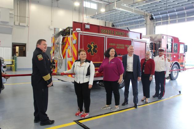 County and Osceola Fire Rescue officials held the “hose uncoupling” ceremony to officially open Fire Station 45 on Calypso Cay near West U.S. Highway 192 and State Road 535. PHOTO/KEN JACKSON