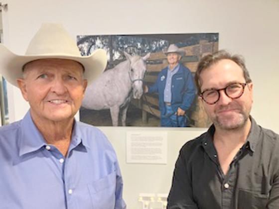 Photographer Mike Dunn with some of the subjects of his “The New 65” exhibit, including local rancher Jimmy Chapman, who isn’t slowing down in his 70s. PHOTO/DAVID CHIVERS