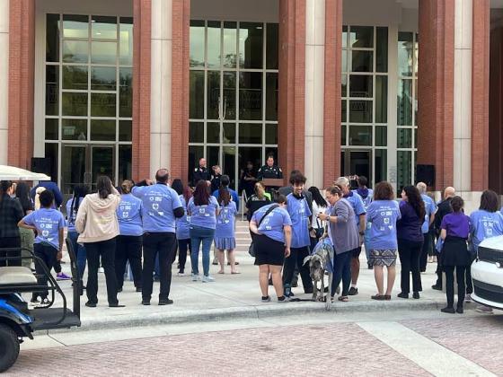 Those tasking a stand against domestic violence came out as a "strength in numbers" show of support at the Help Now of Osceola annual Domestic Violence Awareness Walk &amp; Candlelight Vigil. PHOTO/DONASIA HARRY