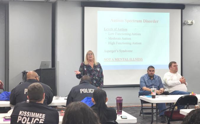 Donna Lorman, a law enforcement trainer for the The Autism Society of Greater Orlando, leads a version of the training Rep. Paula Stark’s Tuesday in Kissimmee. PHOTO/KEN JACKSON