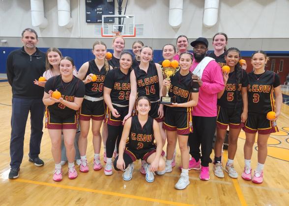 Orange you glad you're a Bulldog? St. Cloud's girls basketball team is after claiming the OBC title again Friday. PHOTO/KEN JACKSON