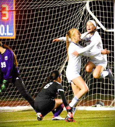 Harmony forward Jayden Frost (leaping) celebrates her goal, the only one in Tuesday's 1-0 win over Celebration in the District 7A-9 girls soccer championship game. PHOTO//KATIE WILLIAMS