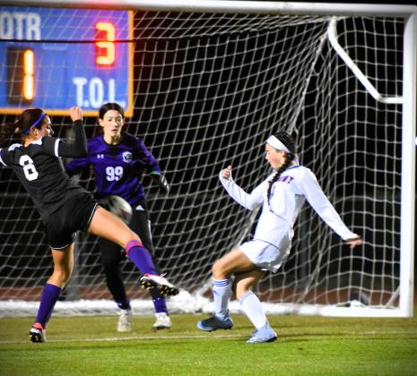 Jayden Frost taps the ball into the net in the second half of Tuesday's district championship game. PHOTO/KAITE WILLIAMS
