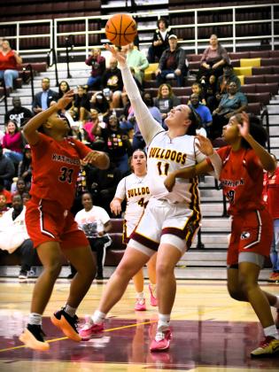Haley Collins, shown in St. Cloud's district championship game, led the Bulldogs with 14 points in Wednesday's regional playoff win over New Smyrna Beach. PHOTO/KATIE WILLIAMS