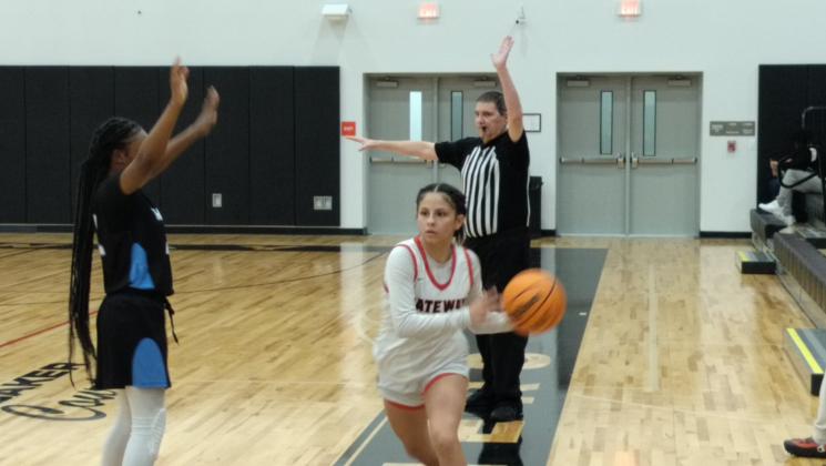 Gateway’s Alyssa Rivera inbounds pass against Lake Region defense.  The sophomore would score 20 points in the Panthers 54-35 win over Lake Region. PHOTO/J. DANIEL PEARSON