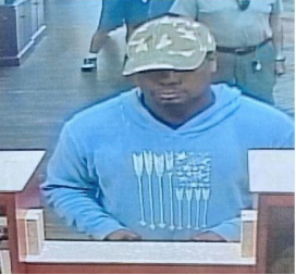 The Osceola Sheriff's Office says Kenyada Jacobs was shown giving a note to a South State bank teller Monday demanding money. PHOTO/OSCEOLA SHERIFF'S OFFICE