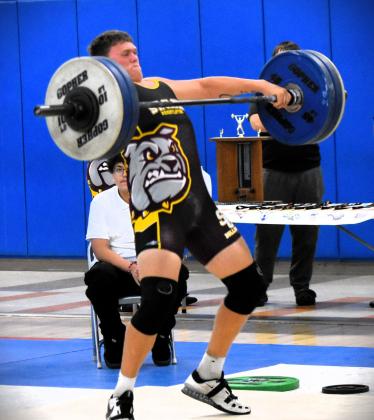 St. Cloud's Conner Howes won both the traditional and Olympic events in the unlimited weight classes Friday to help the Bulldogs to the Orange Belt Conference weightlifting team championship. PHOTO/KATIE WILLIAMS