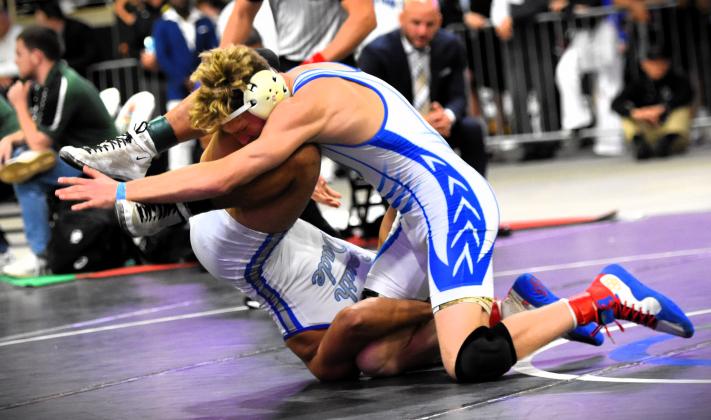 Osceola wrestler Anderson Heap is now a three-time champion after capping off a 24-8 technical fall win over South Dade’s Joshua Aviles to win the Class 3A 150-pound state championship Saturday at the Silver Spurs Arena. PHOTO/KATIE WILLIAMS