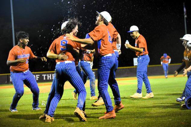 The Harmony celebration continues -- the Longhorns won their Class 7A baseball regional semifinal, 10-6 over No. 1 seed Jupiter on the road Friday. PHOTO/KATIE WILLIAMS