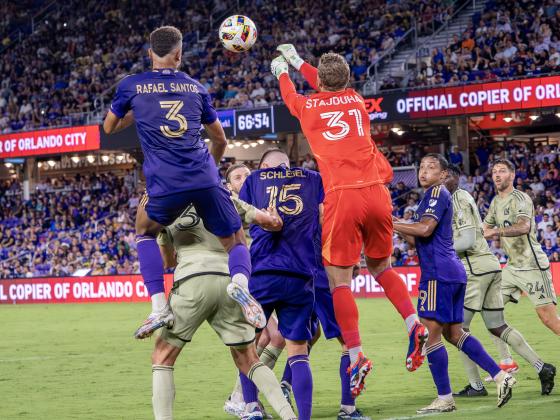 Defense? It's a team effort. Orlando's Rafael Santos (3), Rodrigo Schlegel (15), Luis Muriel (9) and goalkeeper Mason Stajduhar attempt to turn this LAFC shot away Saturday. PHOTO/MARIO CASAMALHUAPA
