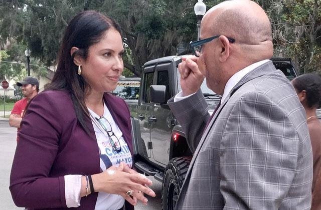 Olga A. Carino and her Attorney Edwin Pradolaw outside the Kissimmee Commissions Chambers with her supporters following Tuesday's Kissimmee City Commission meeting. PHOTO/EMELY ALBELO