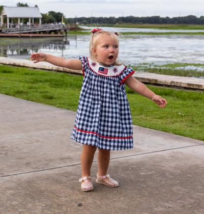 Even the youngest attendees enjoy the 4th of July celebration. PHOTO/TAYLOR MCFEE