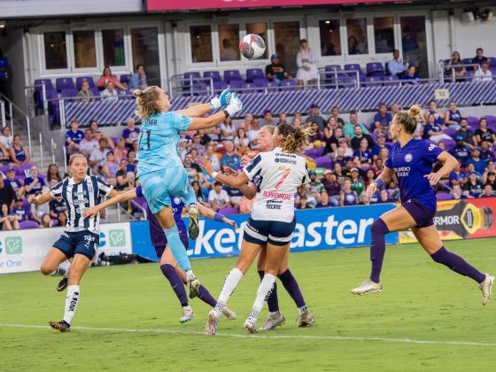 Sofia Manner punches the ball out and helps Orlando Pride get three points in this tough game versus Monterey. PHOTO/MARIO CASAMALHUAPA