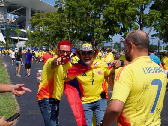 Excited Colombia fans make their way into Hard Rock Stadium for the Copa America final.PHOTO/MARIO CASAMALHUAPA