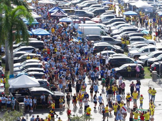 Tens of thousands -- some without tickets -- descended on Miami's Hard Rock Stadium for the final of the Copa America soccer tournament. PHOTO/MARIO CASAMALHUAPA