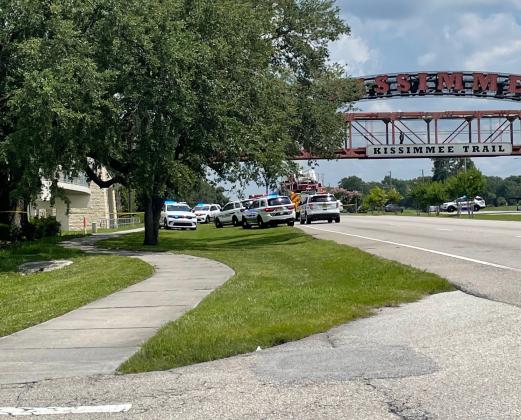 John Young Parkway was closed around lunchtime as police responded to a male's threat to jump from the pedestrian overpass between Donegan an Columbia Avenue. PHOTO/TONI ROWAN