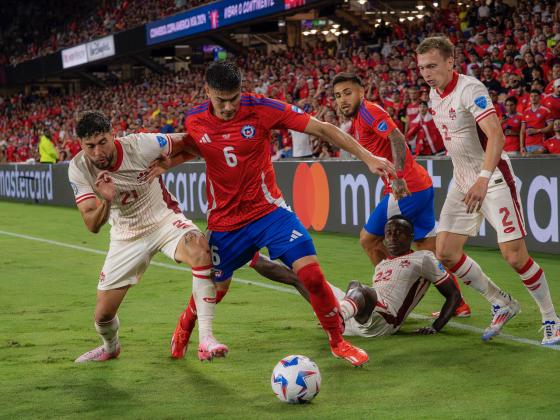 Over 24,000 spectators watched a scoreless draw. Canada advanced to the round to the quarterfinals. PHOTO/MARIO CASAMALHUAPA