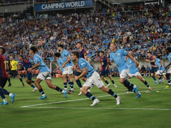 Manchester City Clearing the ball agains a Barcelona corner kick. PHOTO/MARIO CASAMALHUAPA