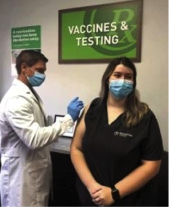 Eric Larson from Prescriptions Unlimited in St. Cloud administers a vaccine to a patient. PHOTO/OSCEOLA COUNCIL ON AGING
