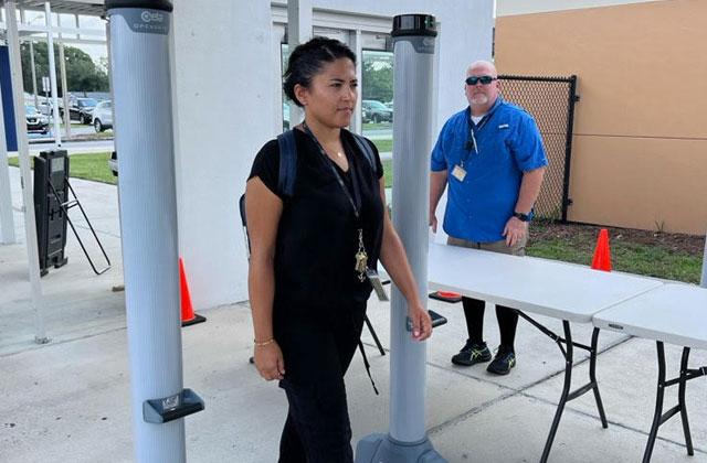 Osceola County School District officials demonstrate the weapons detection system that will be in place at Osceola High School starting Monday. PHOTO/SCHOOL DISTRICT OF OSCEOLA