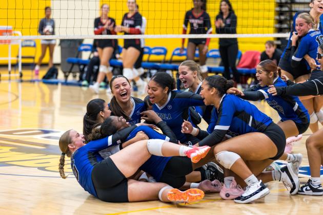 The thrill of victory: the Osceola Kowboys became regional volleyball champions Wednesday with a three-set victory over Vero Beach. PHOTO/TAYLOR MCFEE
