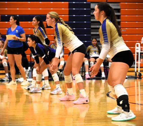 Osceola prepares to take a serve from Harmony in Thursday's title match. PHOTO/KATIE WILLIAMS