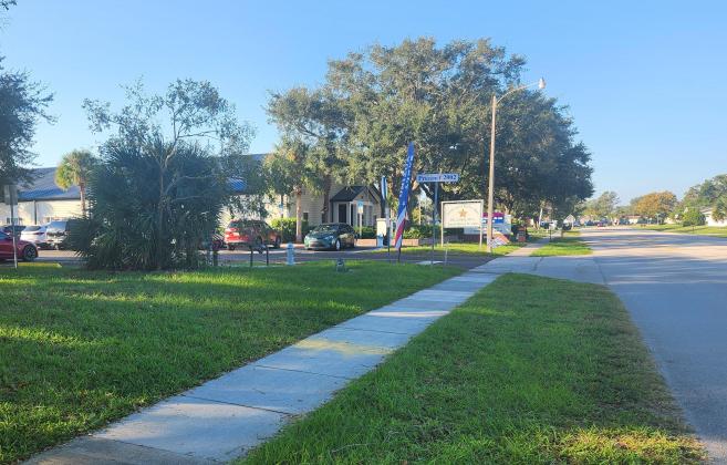 The lack of campaign signs was apparent Tuesday outside of the Robert Guevara Community Center in Buenaventura Lakes, an early voting site, Tuesday. County code enforcement is upholding a ban on such signs outside of county-owned facilities. PHOTO/KEN JACKSON