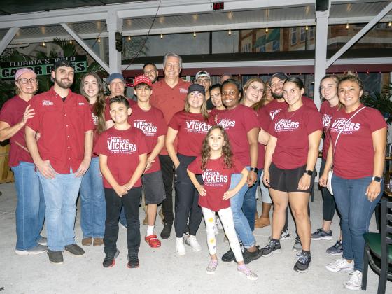 Osceola Tax Collector Bruce Vickers celebrates his re-election victory with staff Tuesday night in downtown Kissimmee. PHOTO/MARIO CASAMALHUAPA