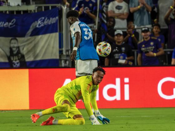 Pedro Gallese comes out of the box to make a sliding save. Th Orlando City goal keeper also had two critical penalty stops to help the team win the shootout and the game. PHOTO/MARIO CASAMALHUAPA